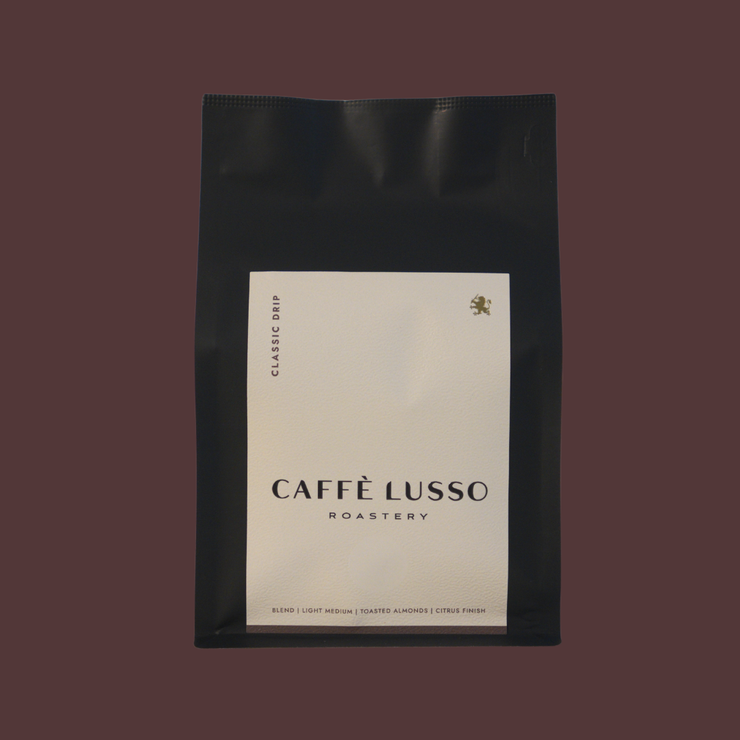 Caffè Lusso coffee bag of Classic Drip on a Brown background