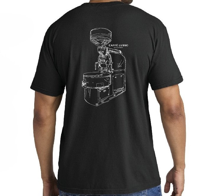 Man wearing a black t shirt with a white sketching of a roasting machine on the back