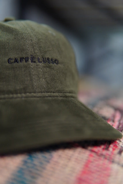 Olive green hat with embroidered Caffe Lusso Logo.