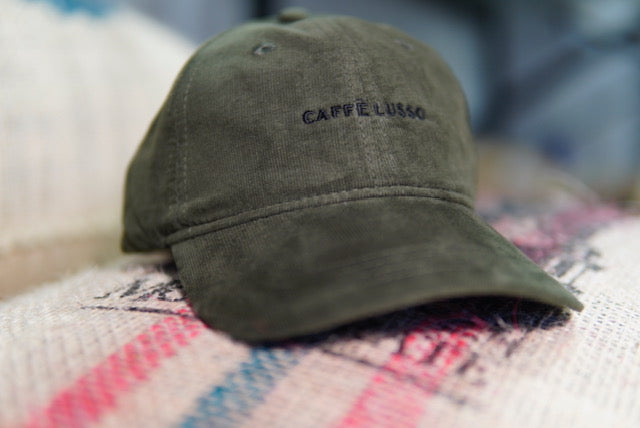Olive green hat with embroidered Caffe Lusso Logo.